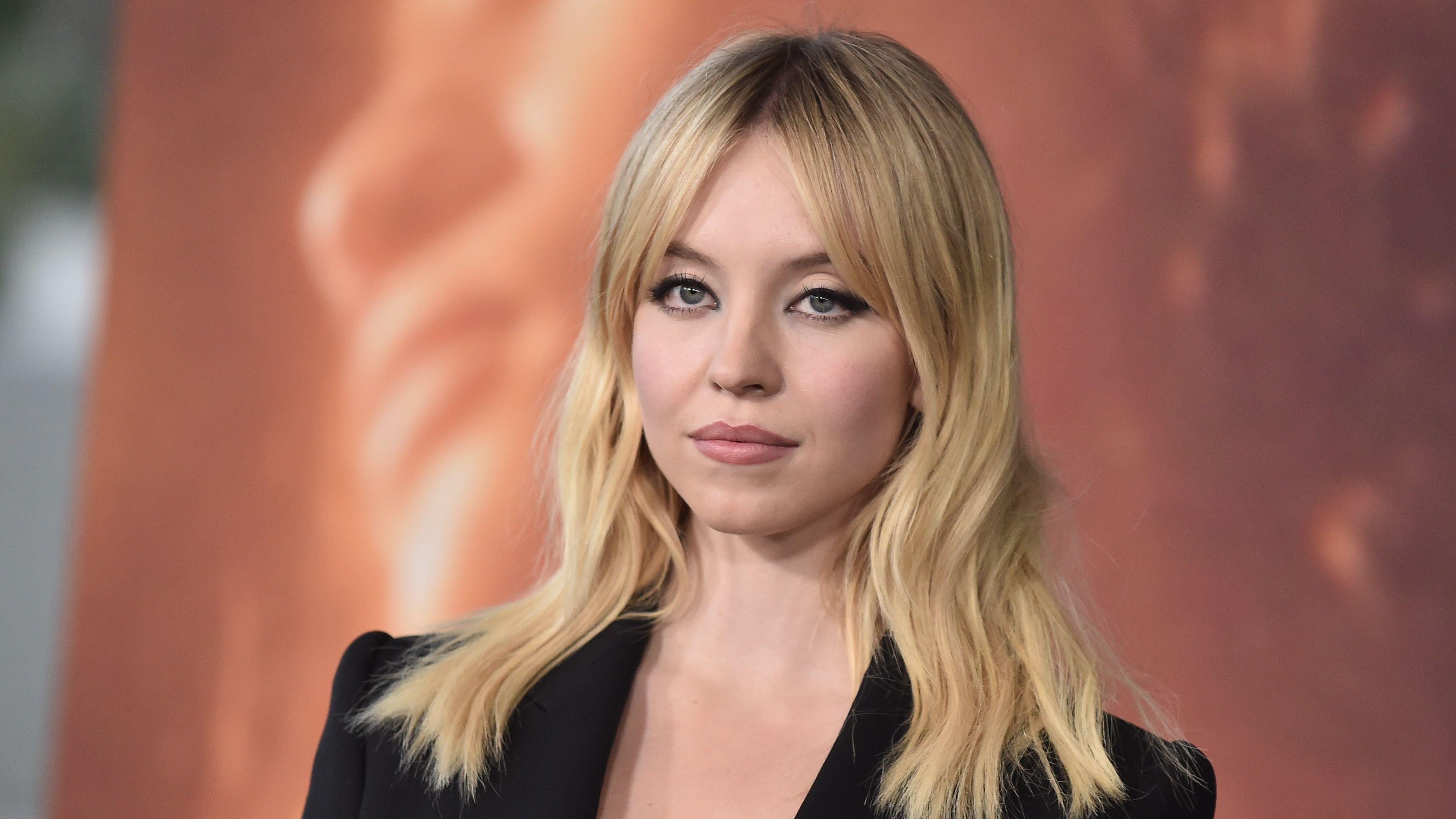 Closeup of Sydney Sweeney with center-parted hairstyle