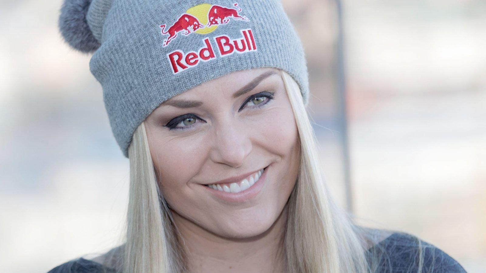 Lindsey Vonn wearing a grey Red Bull beanie and black shirt.