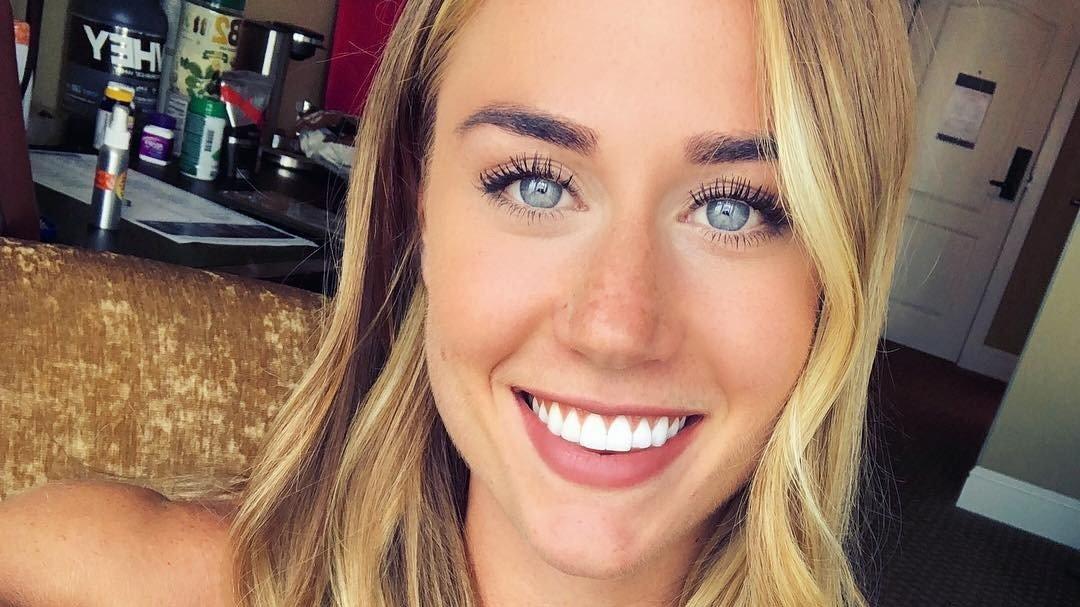 Brooke Wells smiling at the camera in a selfie.
