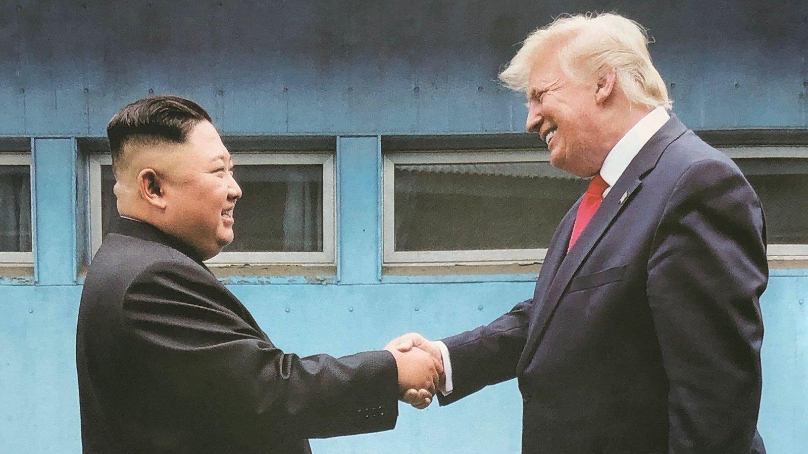 North Korea's Kim Jong Un, former President Donald Trump shake hands