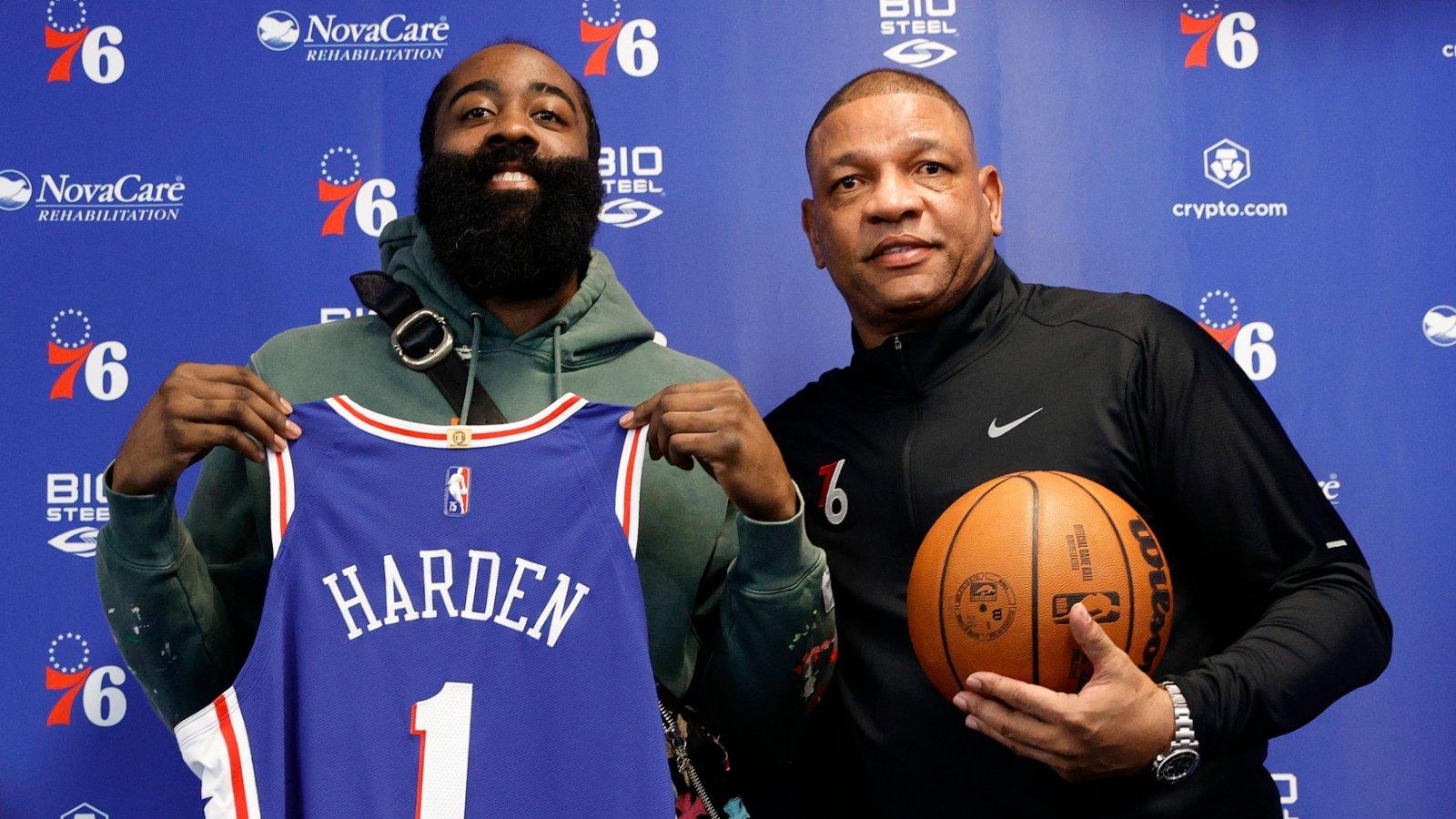 James Harden taking a picture with Coach Doc Rivers