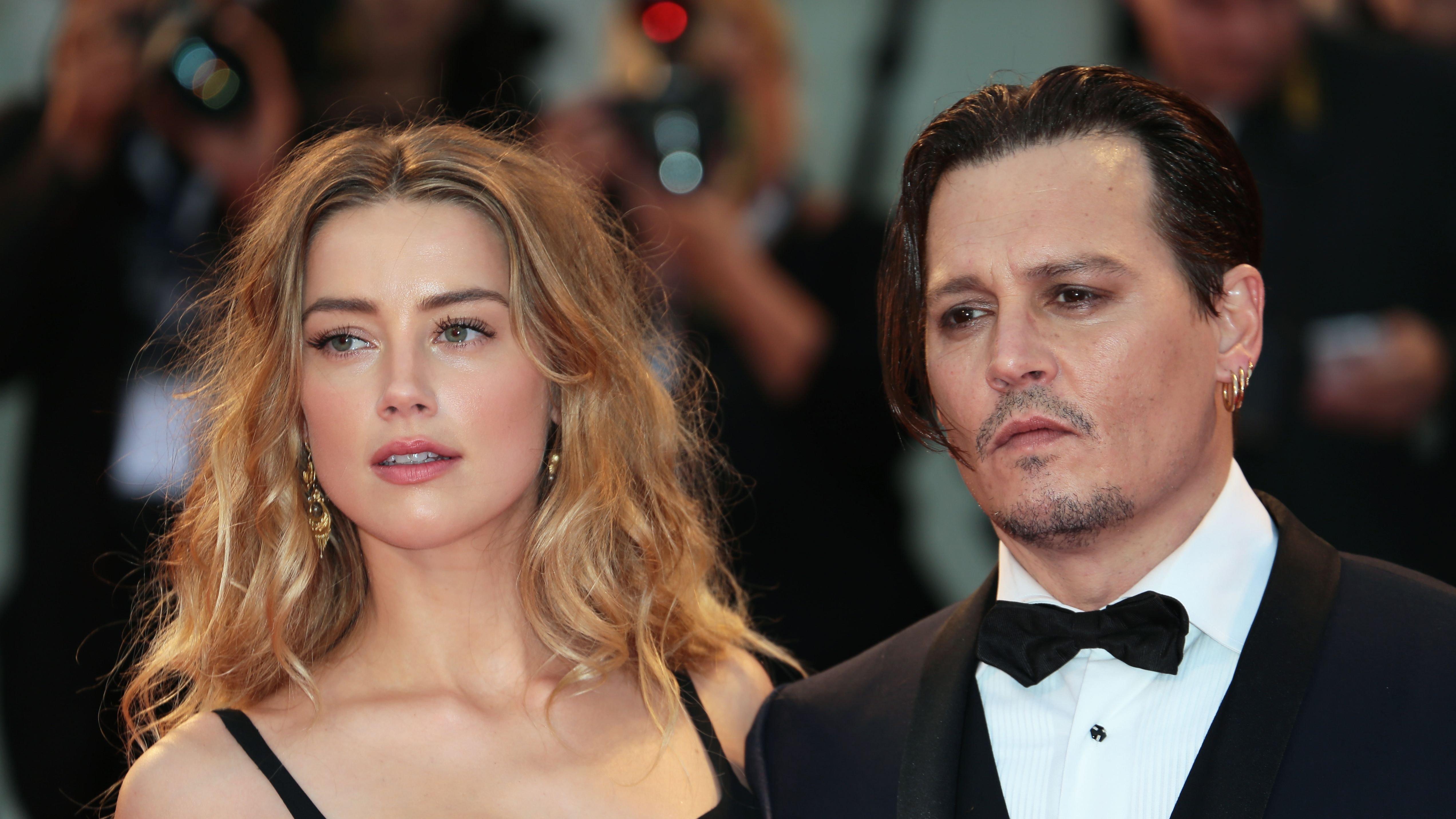 Close up of Johnny Depp and Amber Heard