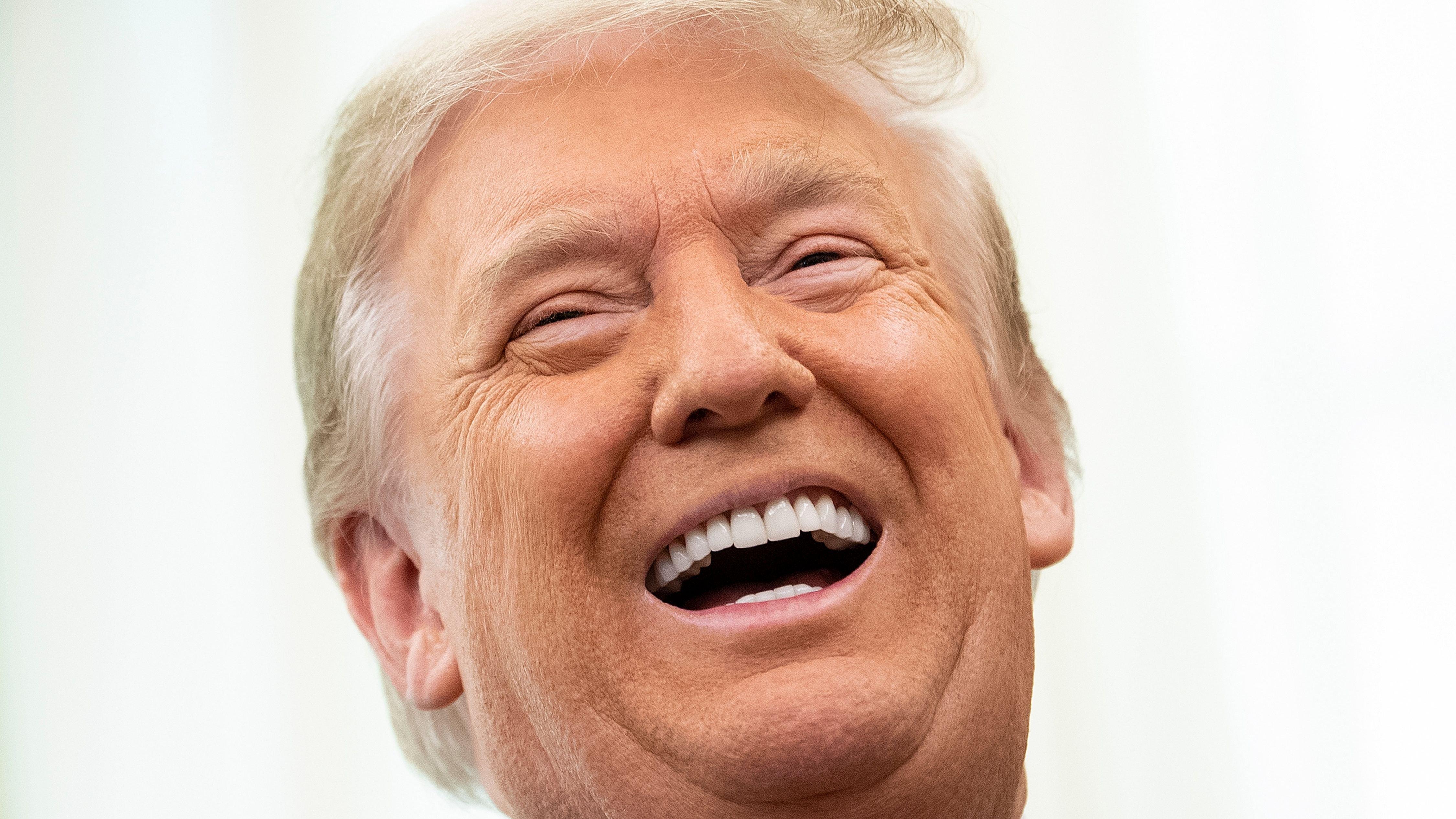 Former President Donald Trump pictured laughing
