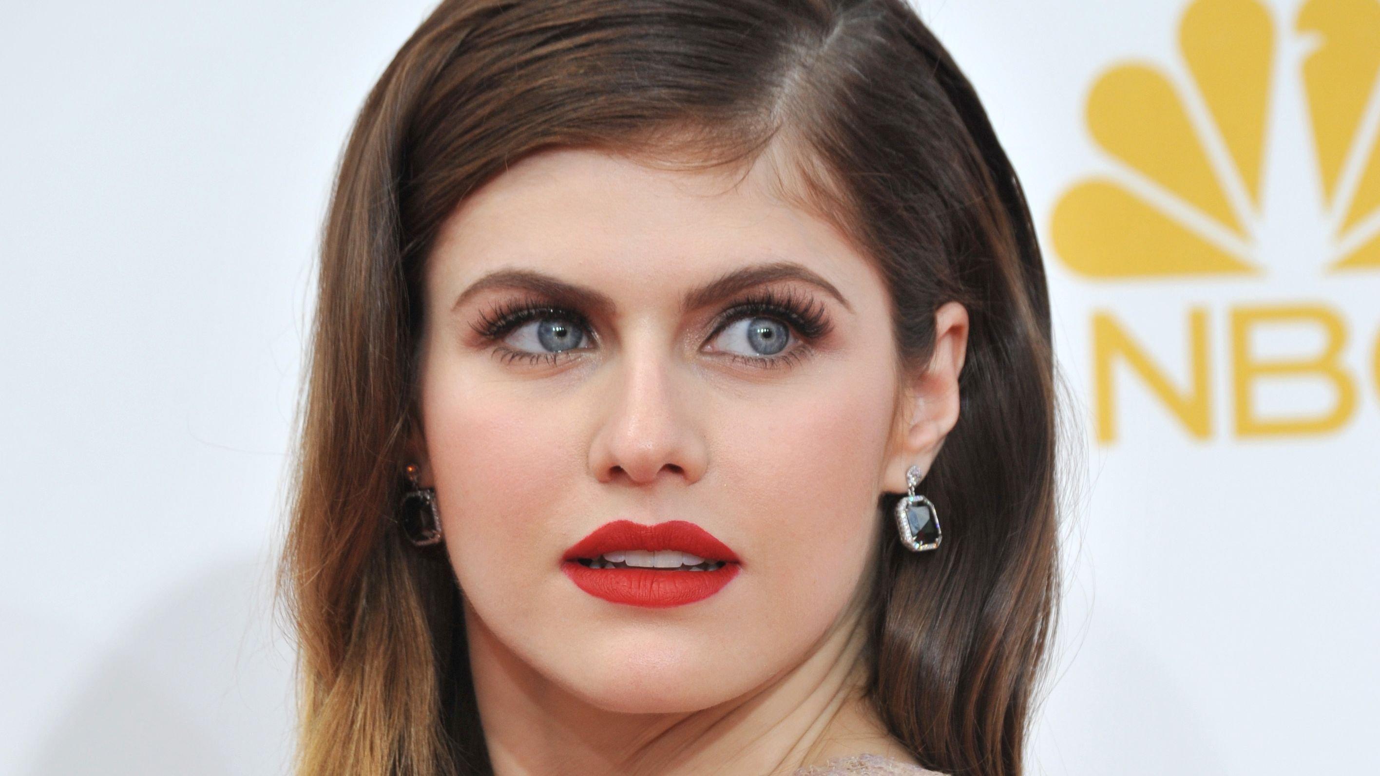 Close up of Alexandra Daddario with parted red lips
