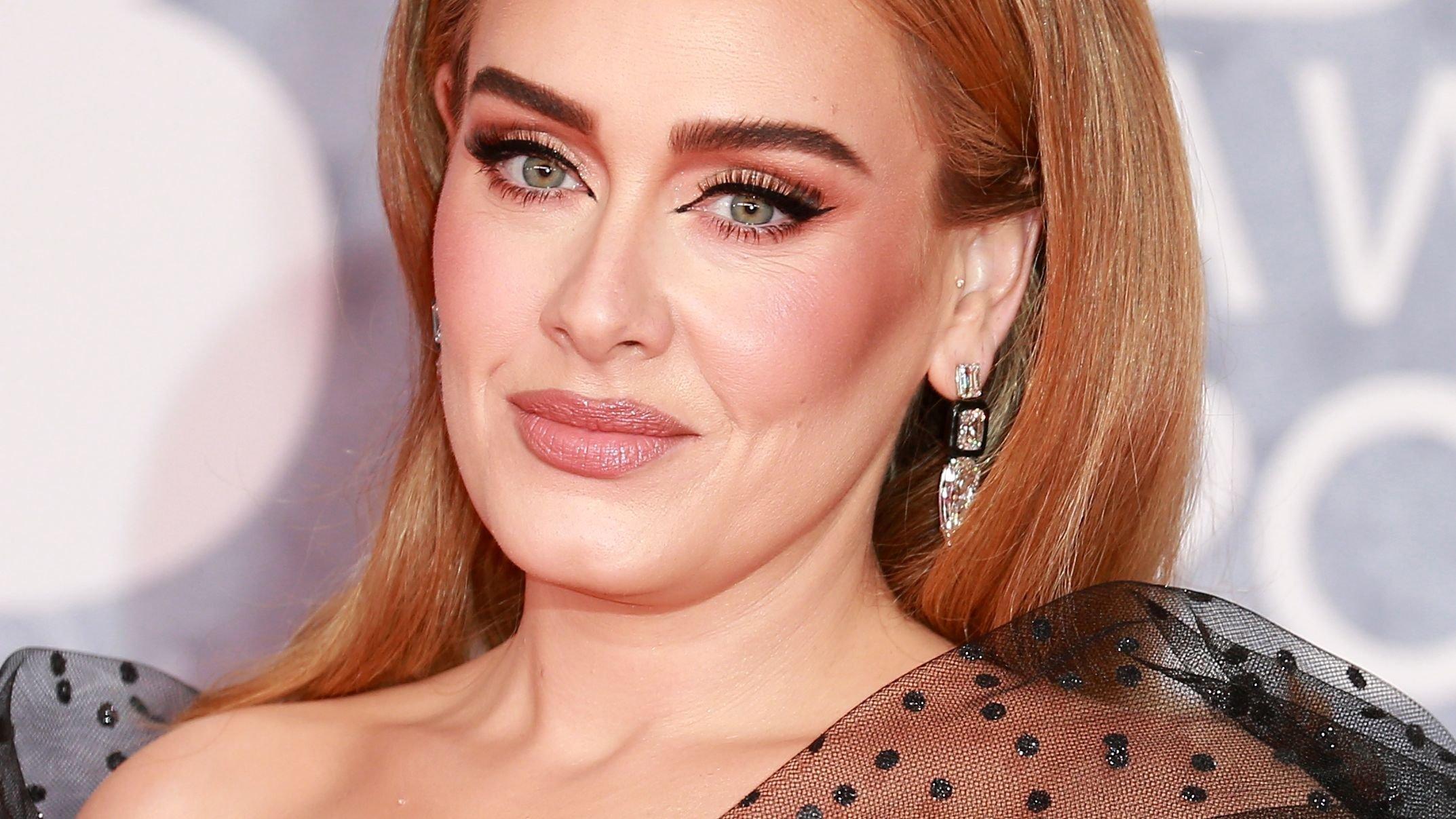 Closeup of Adele with side-parted hairstyle