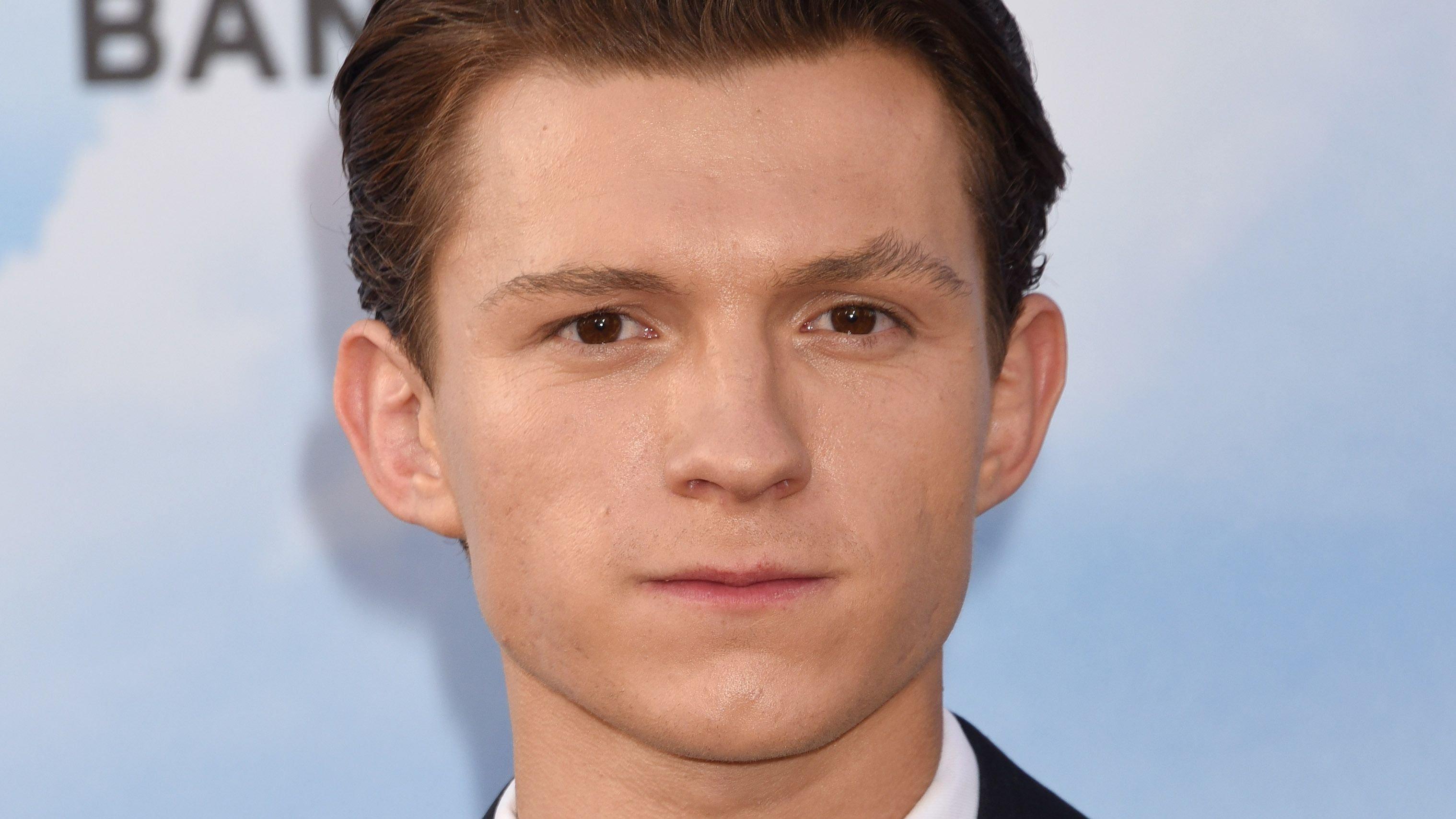 Tom Holland with stern look on face