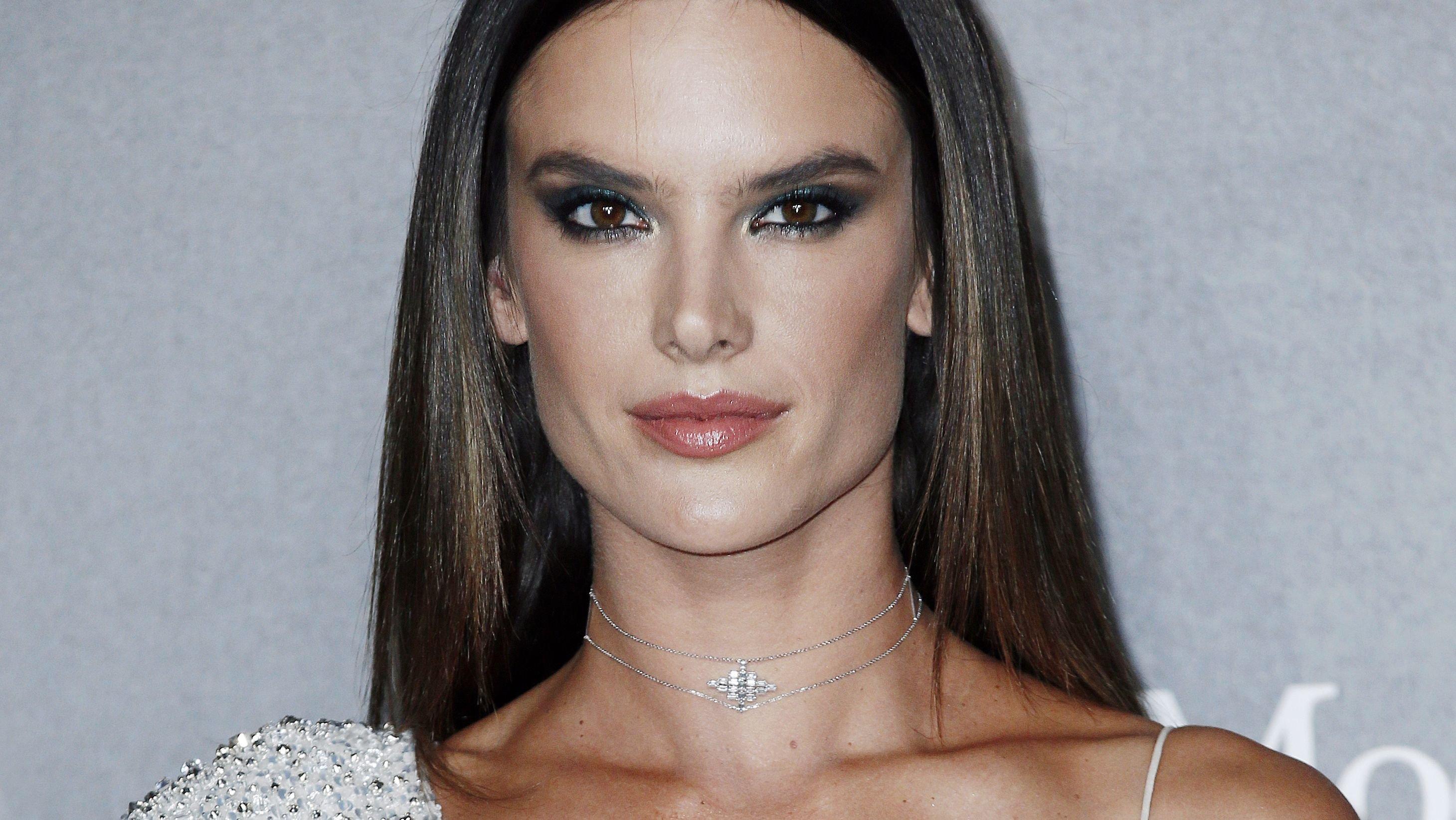 Alessandra Ambrosio Stuns In See-Through Top And Thigh-High Boots