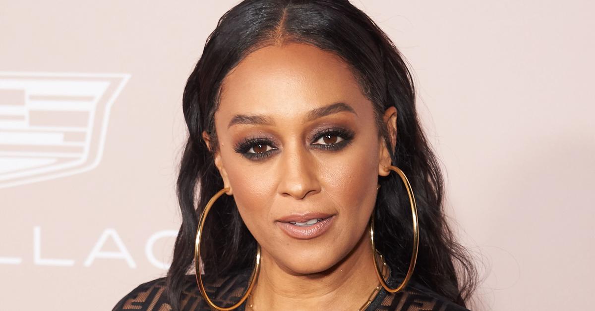 Tia Mowry Shows Off Her Sexy And Fun Side In A Minidress And Thigh-Highs