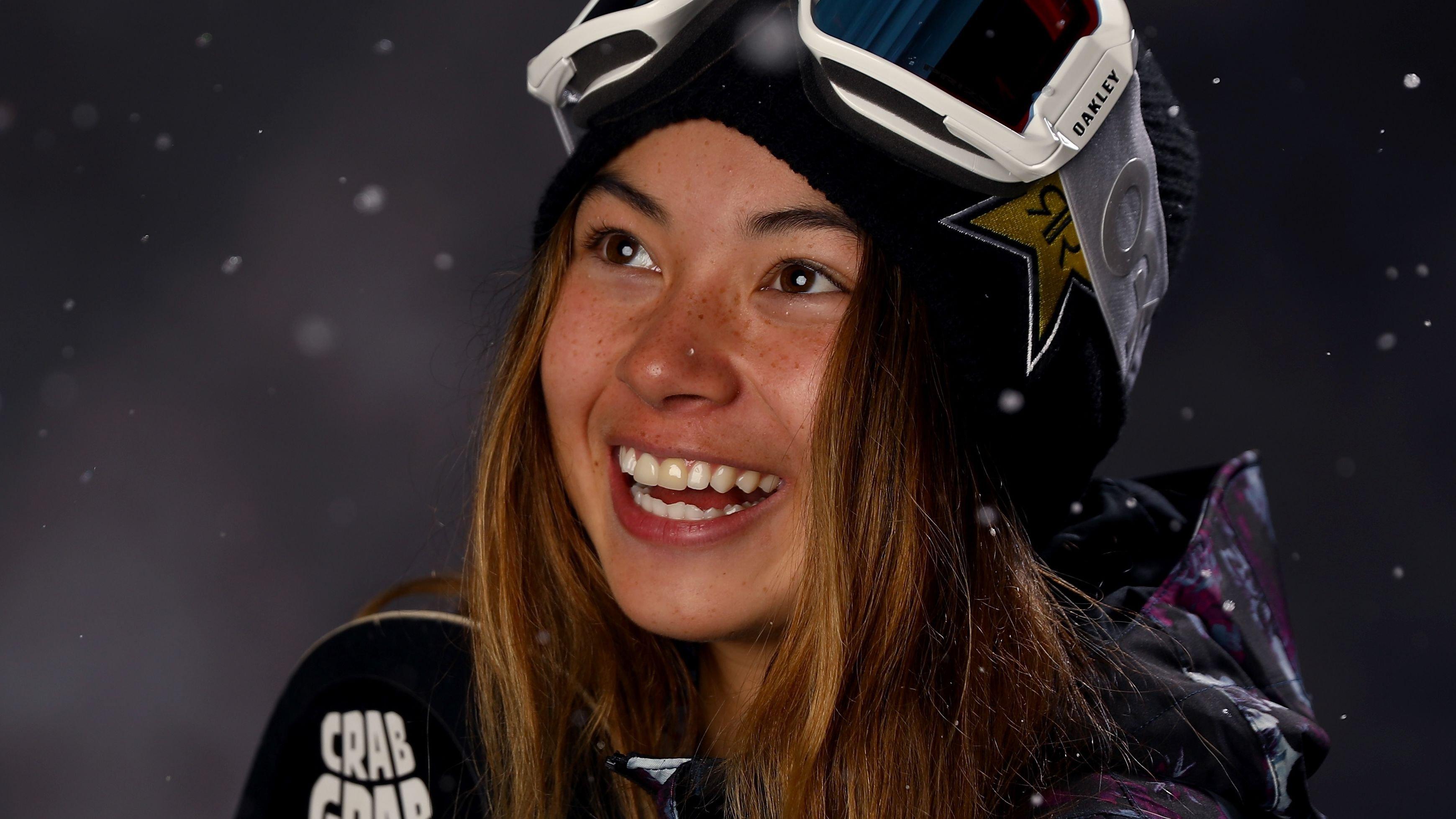 Hailey Langland wearing ski gear and smiling.