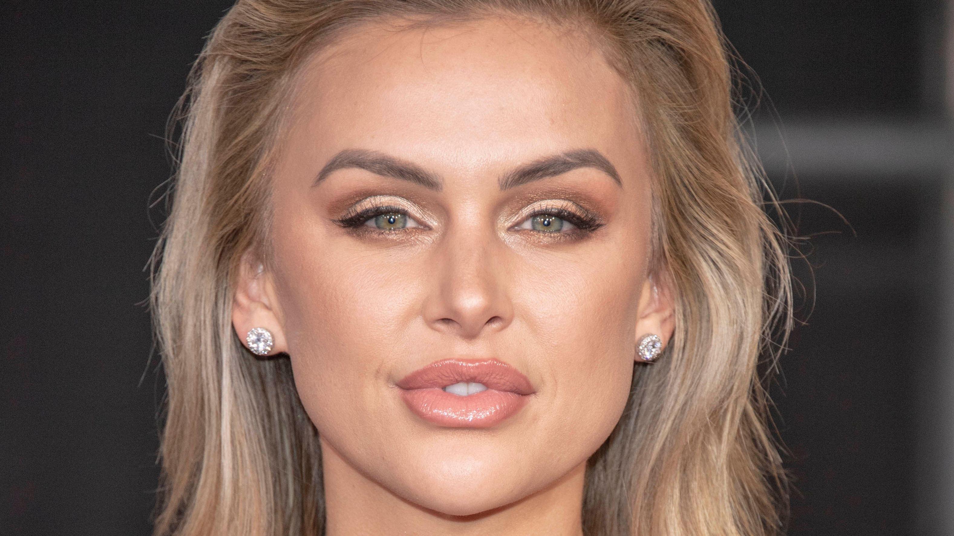 Lala Kent with dark eyeshadow and hair brushed back