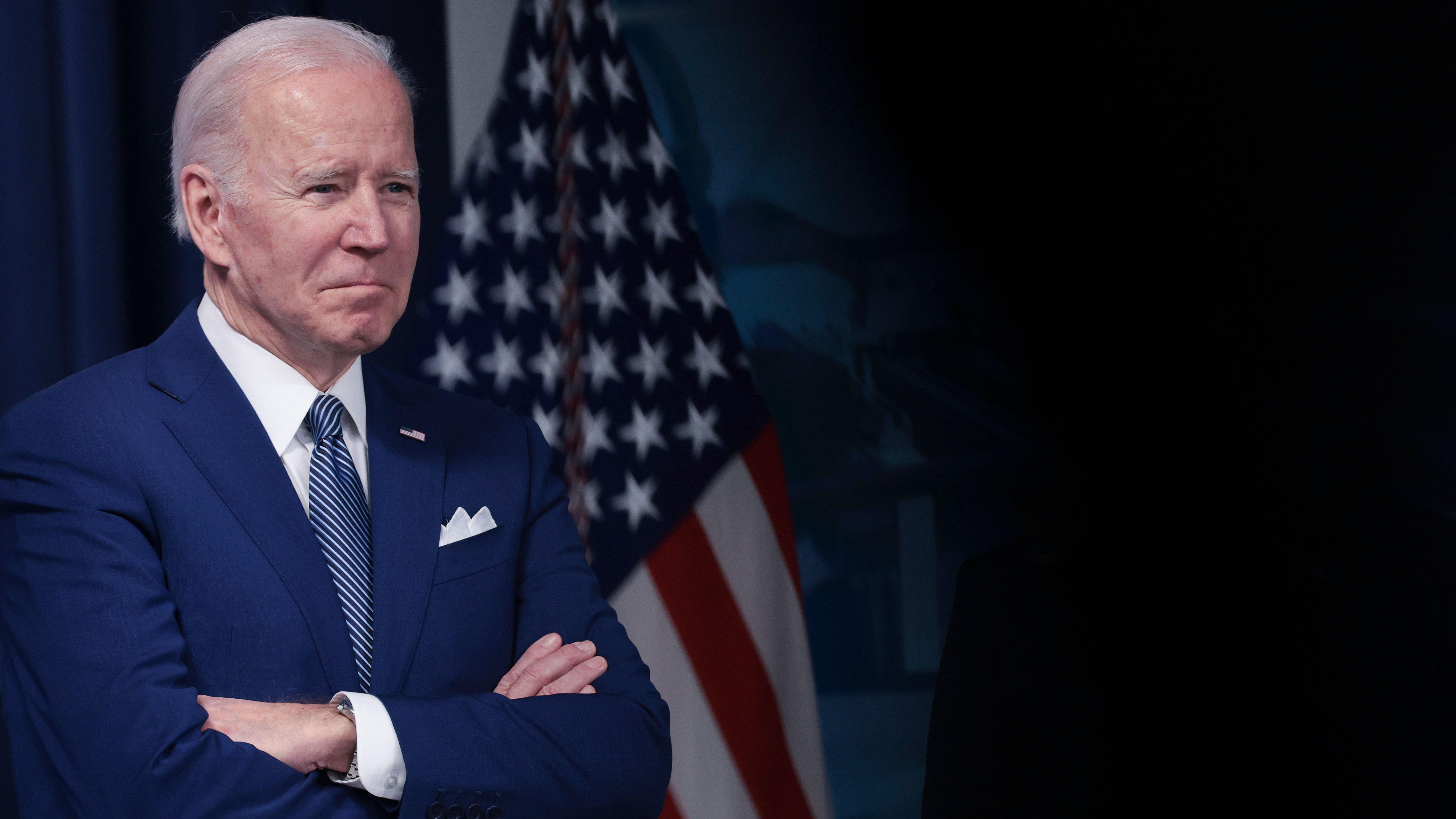 President Joe Biden looks on 