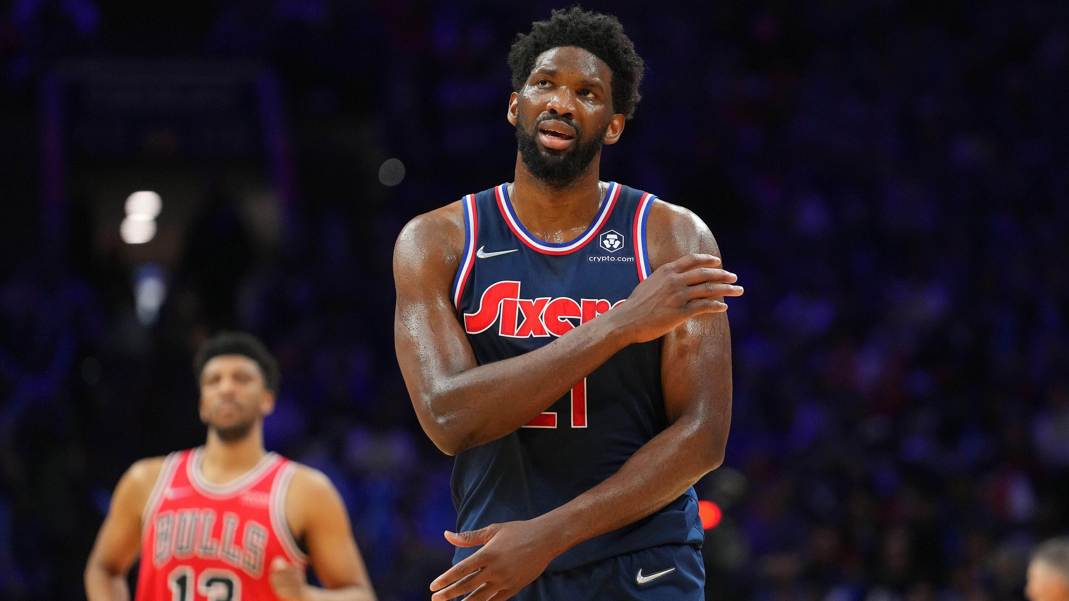 Joel Embiid watching the replay