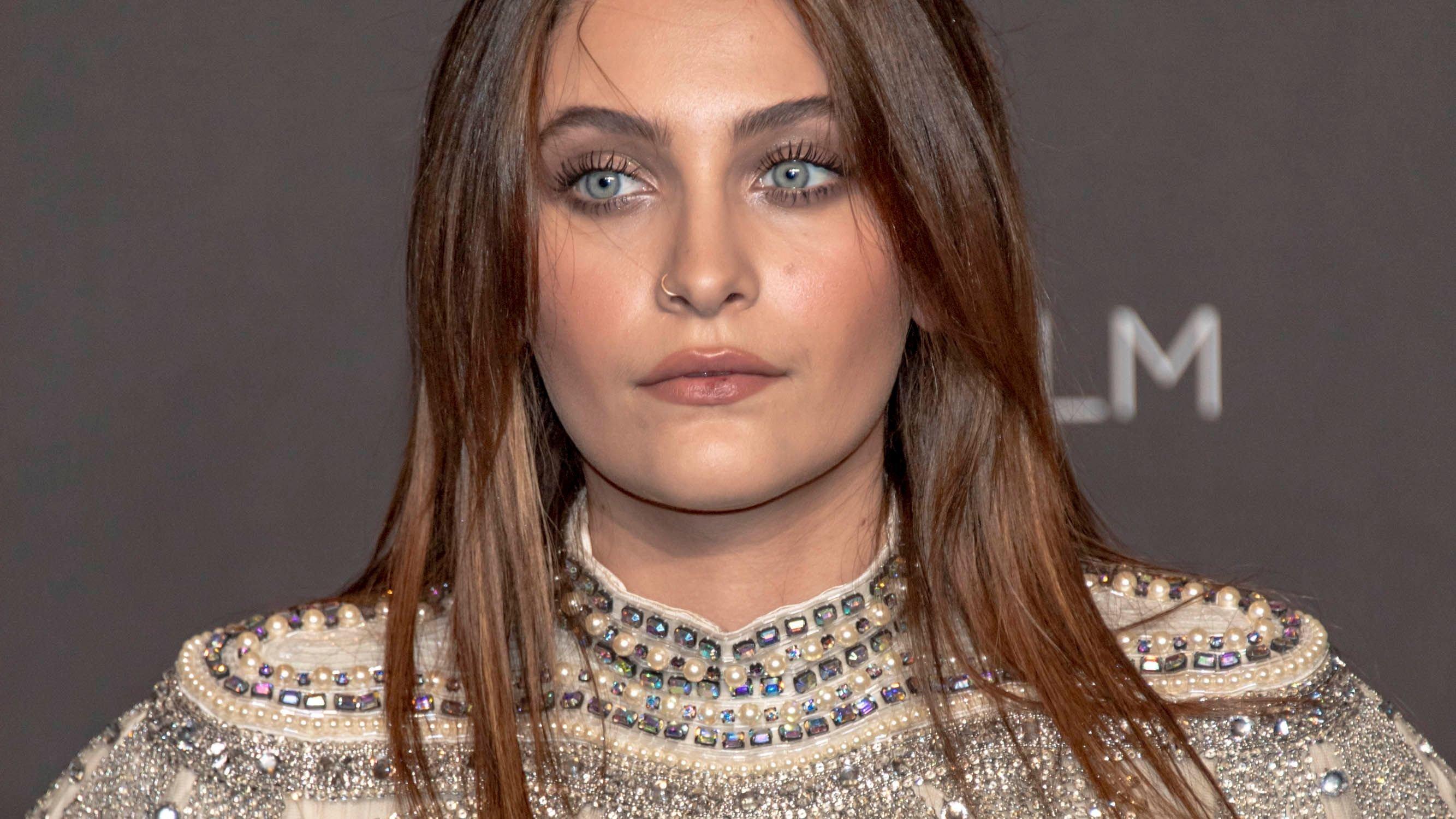 Closeup of Paris Jackson with center-parted hairstyle