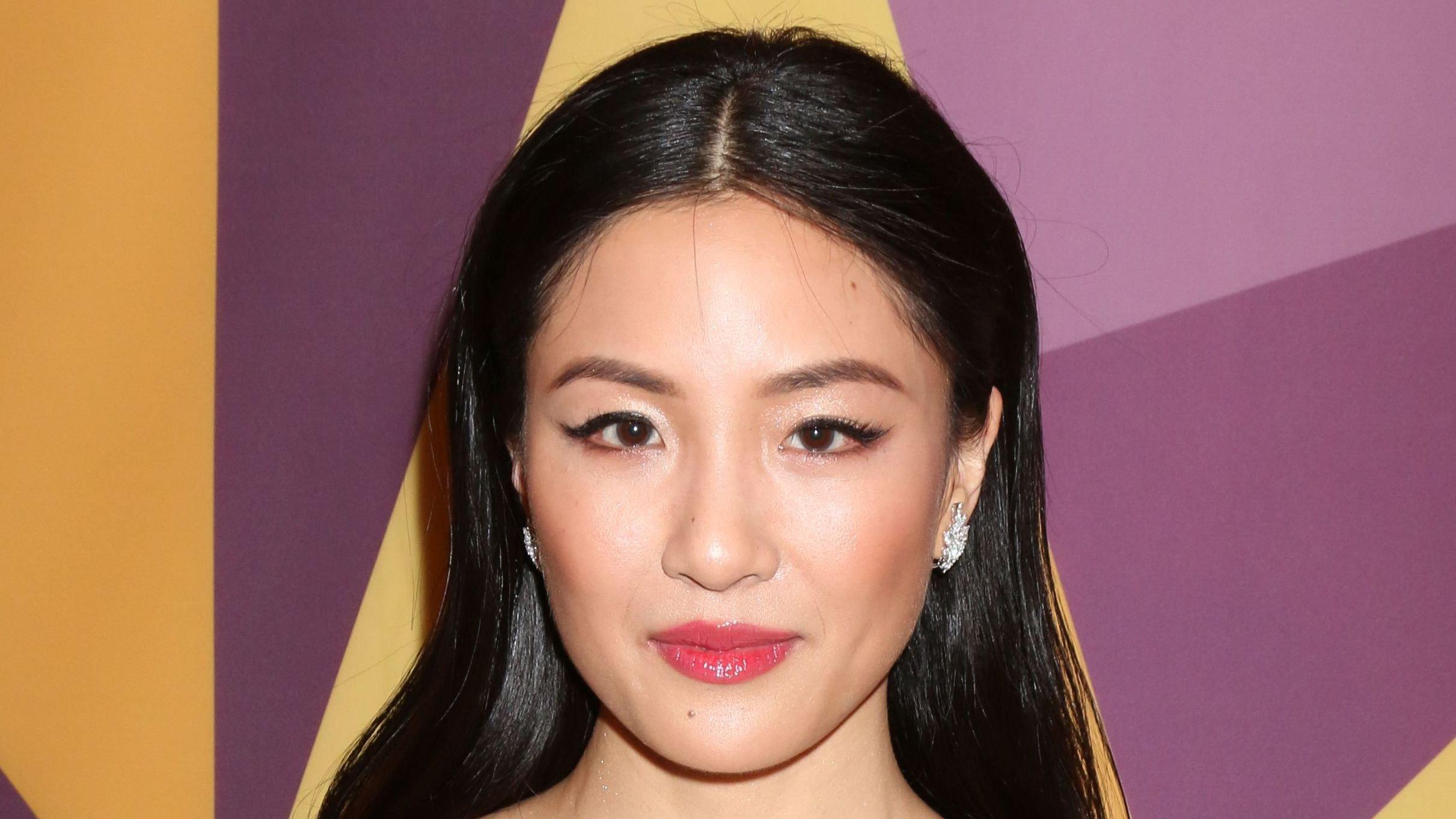 Closeup of Constance Wu with long straight hair