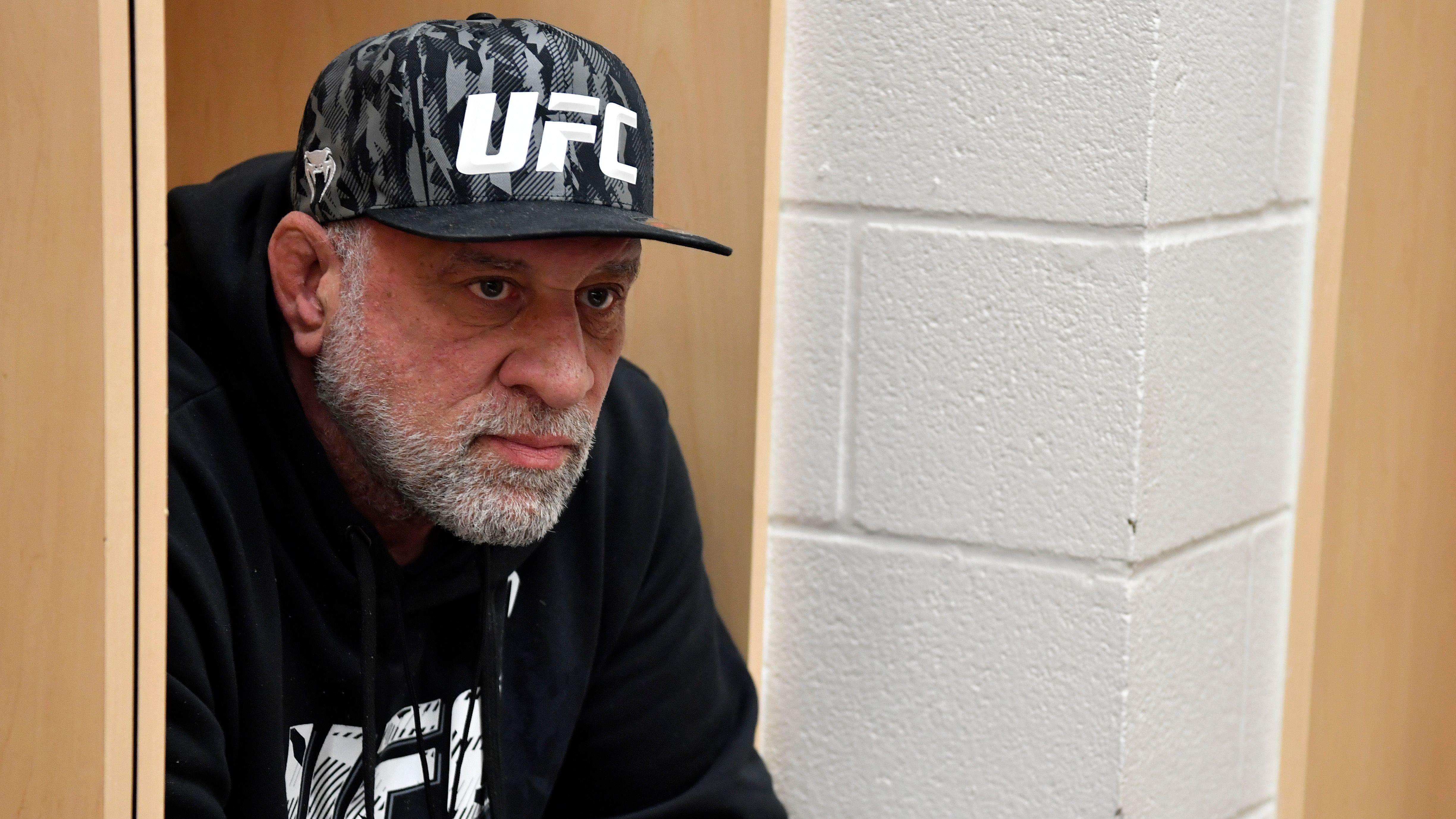 Mark Coleman wearing an UFC cap wth an angry expression