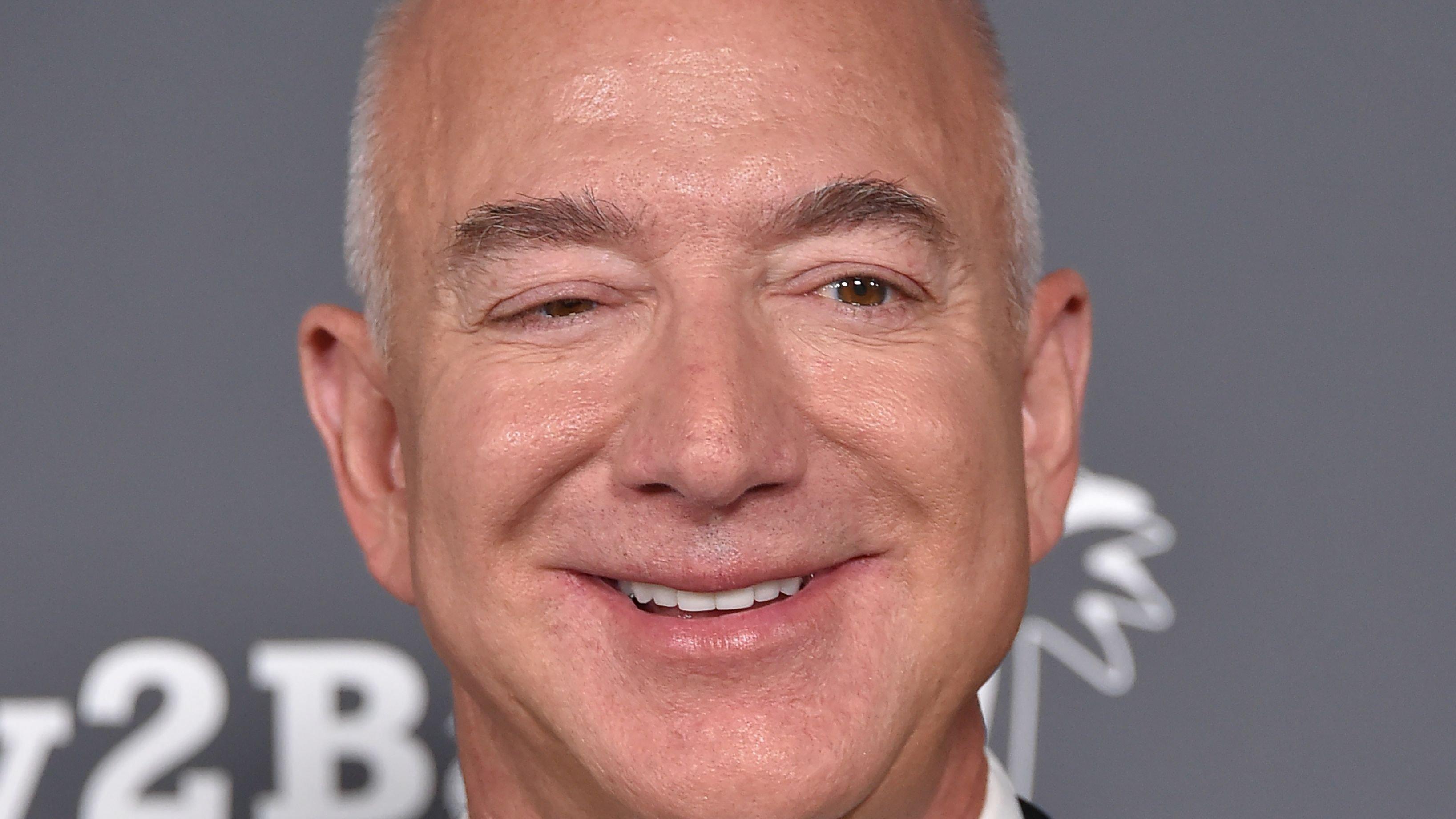 Amazon founder Jeff Bezos looks on