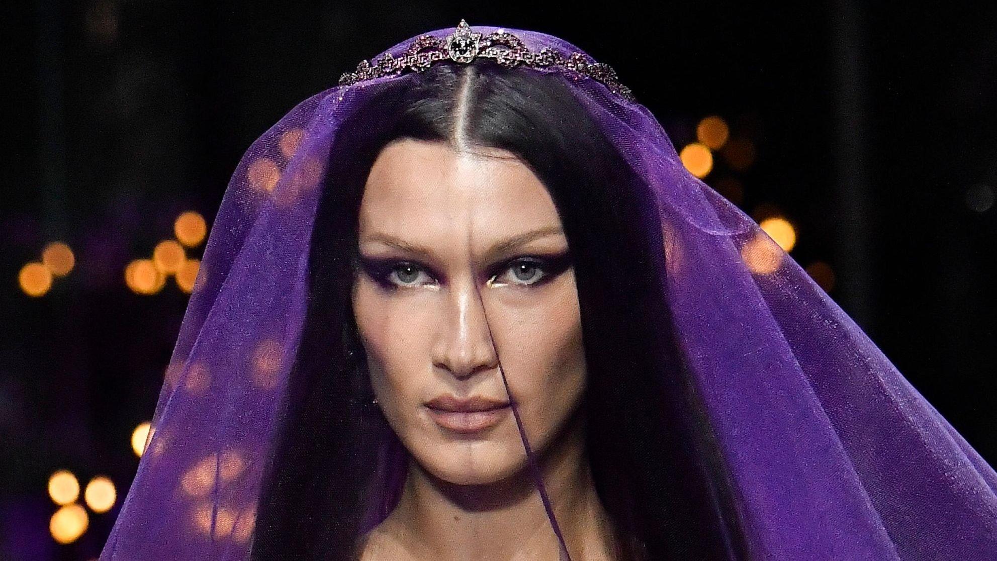 Close up of Bella Hadid in a purple veil at Milan Fashion Week 2022
