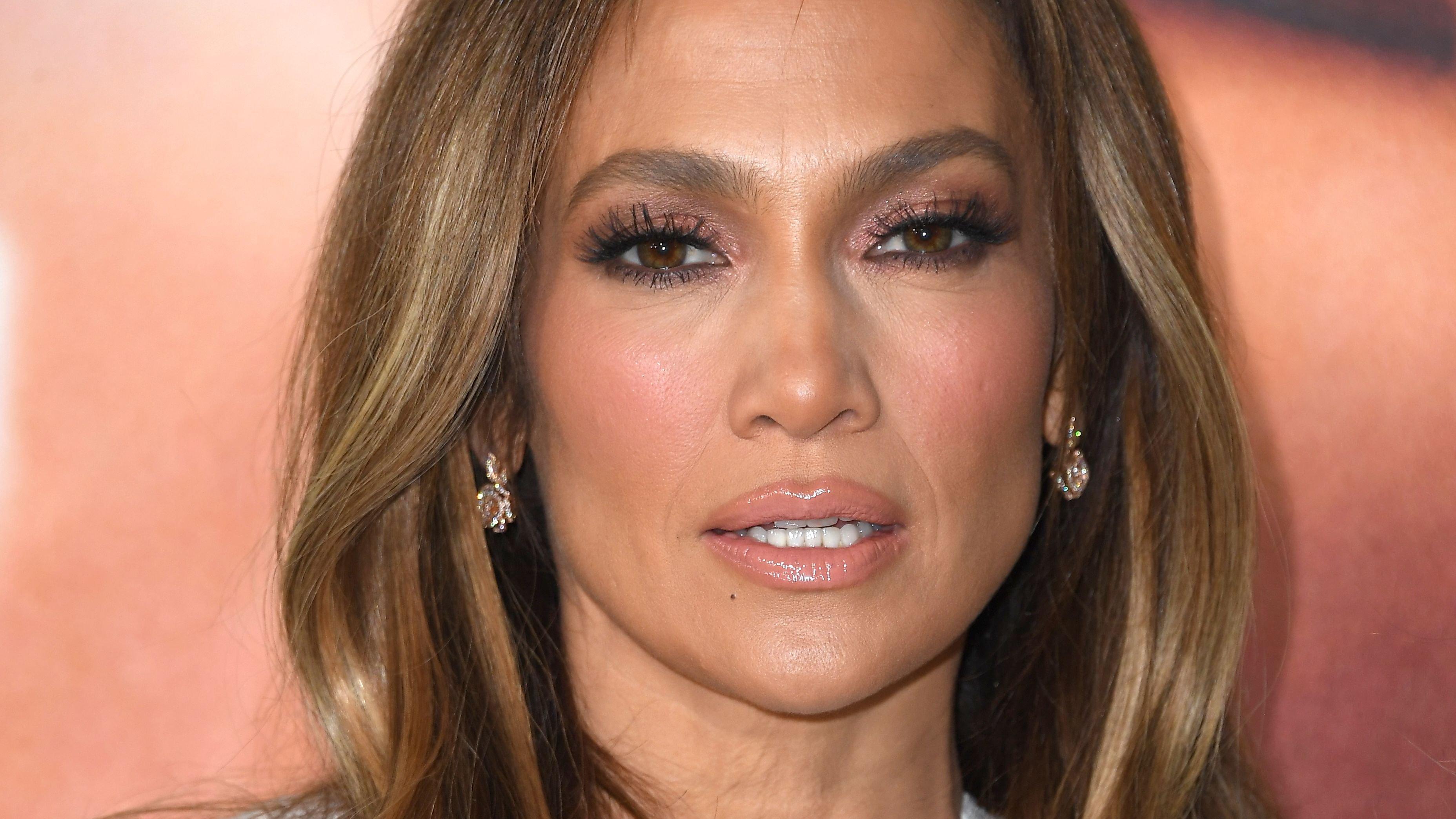 Closeup of Jennifer Lopez with long center-parted hairstyle
